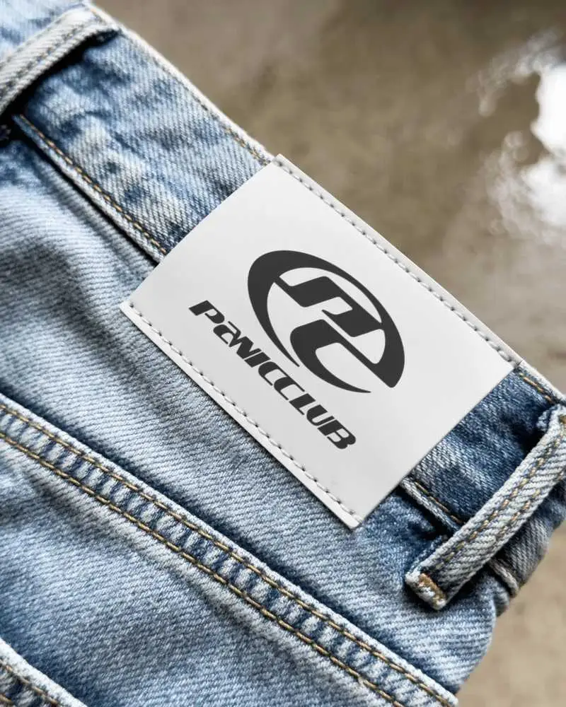 Premium Denim Patch Label Mockup Stitched On Jeans Waistband With Authentic Branding Detail