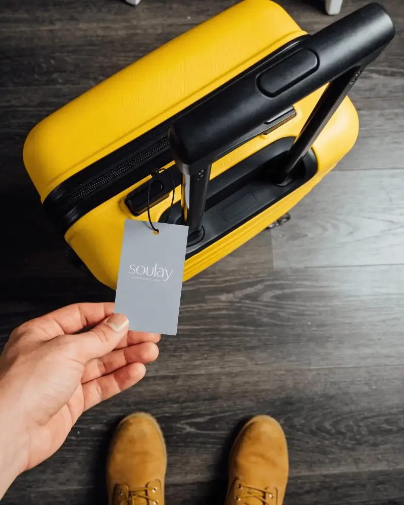 Airport Ready Baggage Label Mockup With Traveler Perspective And Adventure Inspired Composition