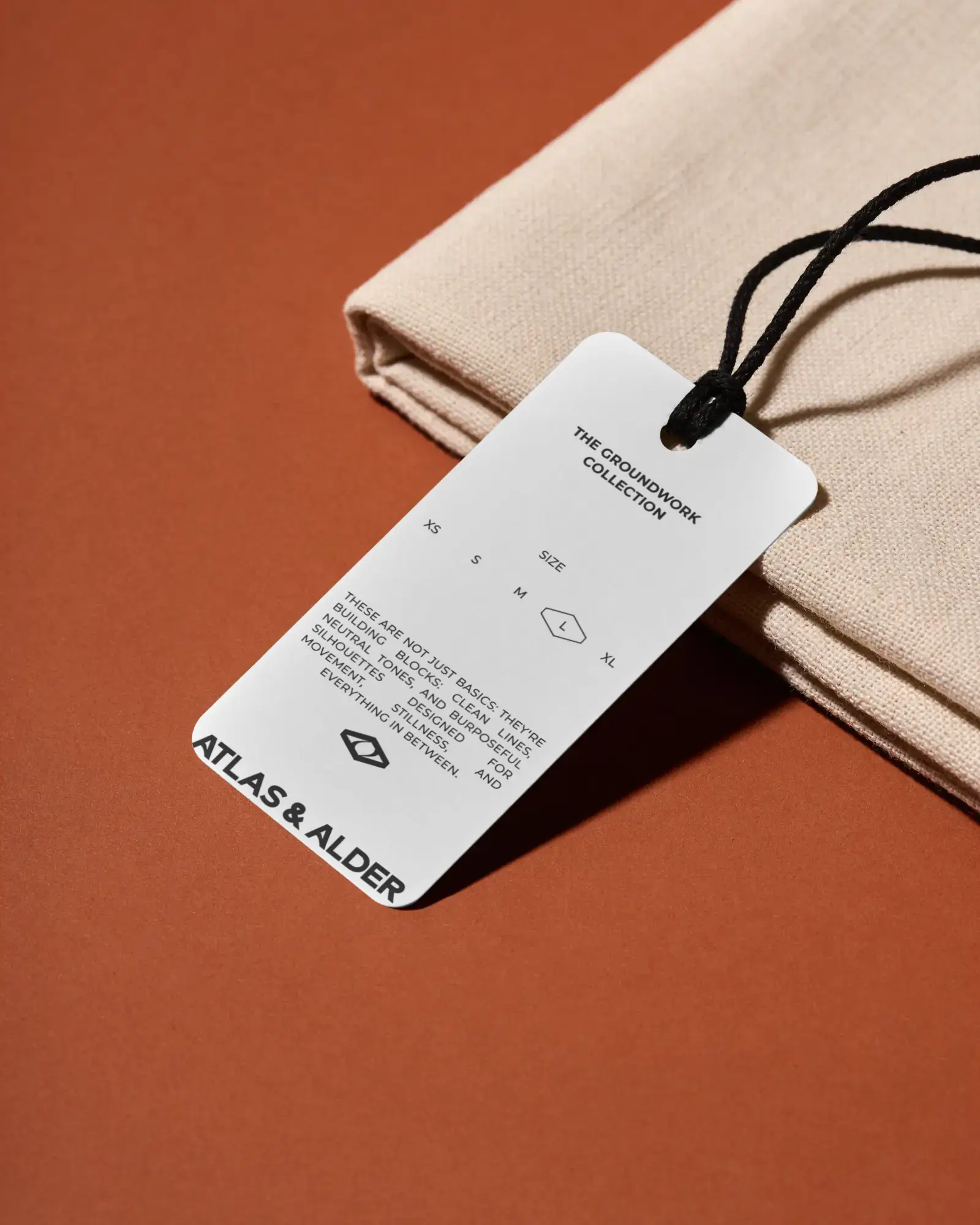 Minimalist Hang Lable Mockup Placed On Textile Fabric For Custom Label Designs Presentation