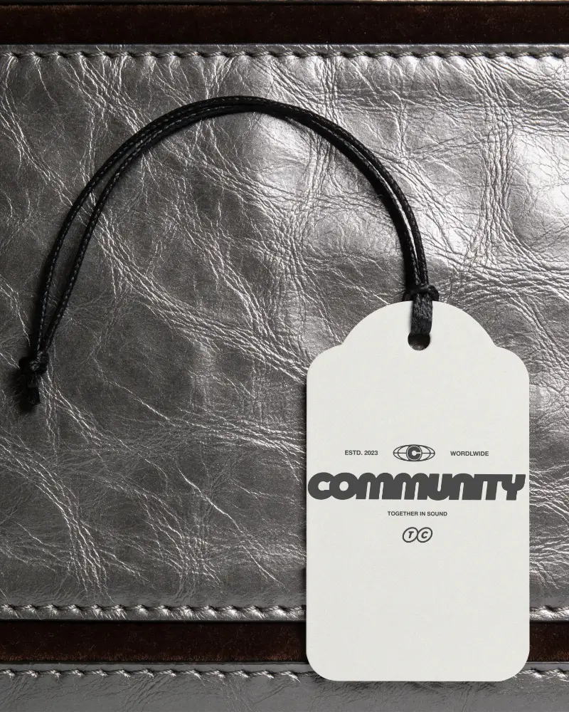 Empty Price Label Mockup Attached To Fabric Surface With Knotted String Fashion Accessory