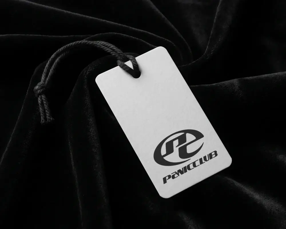 Closeup Photorealistic Rectangle Label Mockup On Textured Material With Rope String Attached