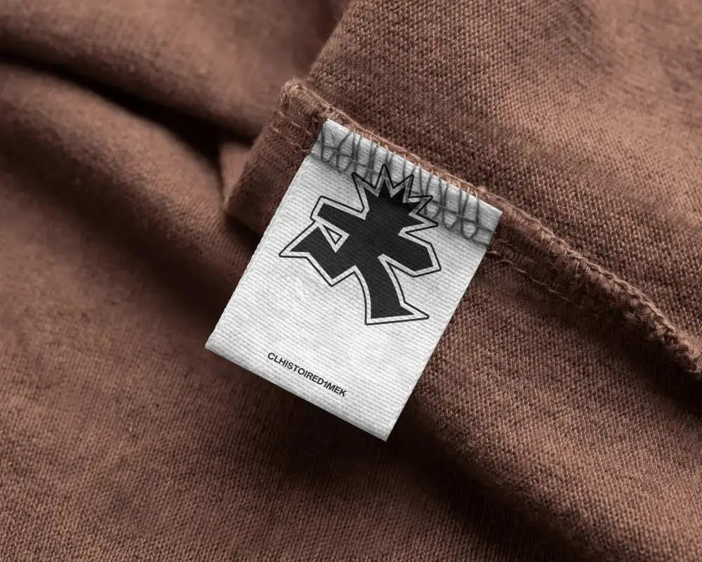 High Resolution Fabric Label Mockup On Textured Sewn Garment Closeup Photography