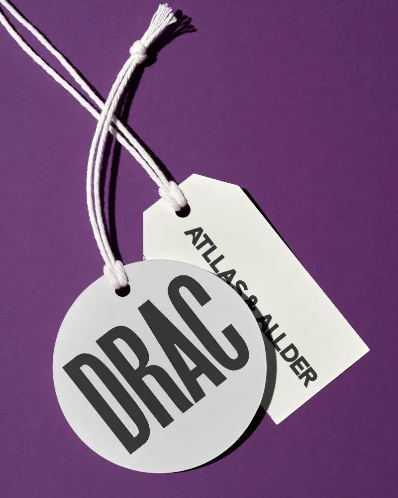 Blank Round And Rectangular Clothing Label With String Mockup On Solid Background