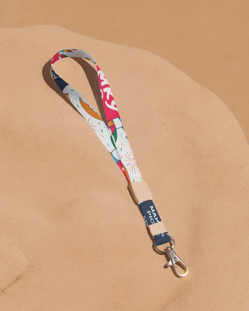 Elegant Lanyard Mockup On Warm Sand Surface With Metal Clip And Clean Flat Lay