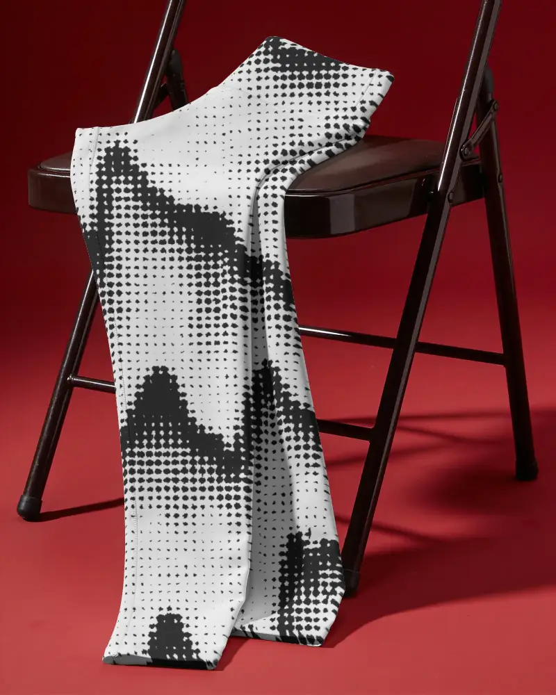 Folded Leggings Mockup Draped Over Chair Seat In Dramatic Product Studio Scene