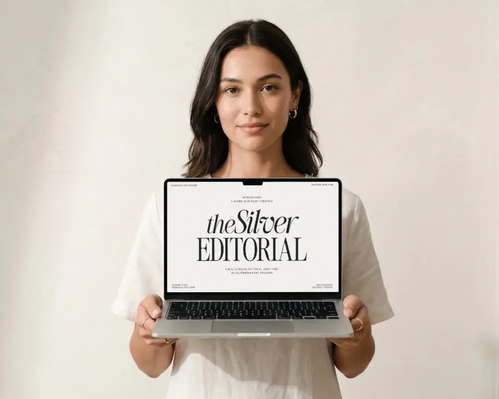 Female Presenting Macbook Air M3 Mockup With Empty Display For Marketing Or Portfolio Use