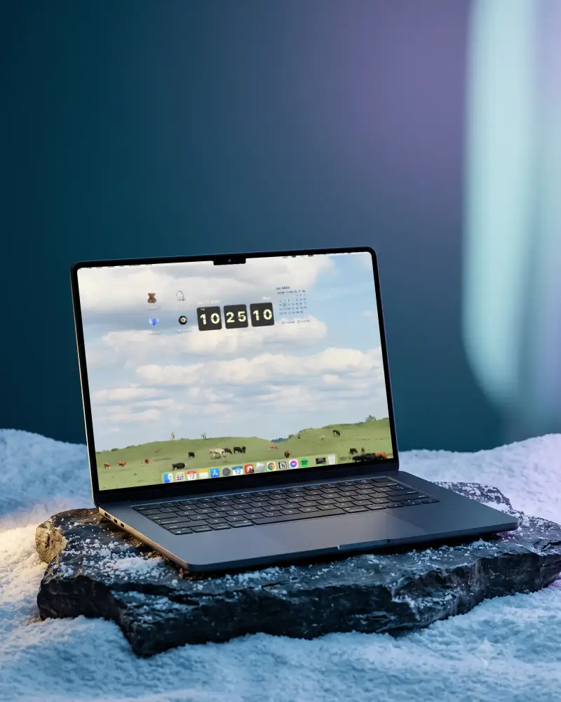 Sleek Modern Macbook Air M2 On Natural Rock Surface For Creative Digital Presentations