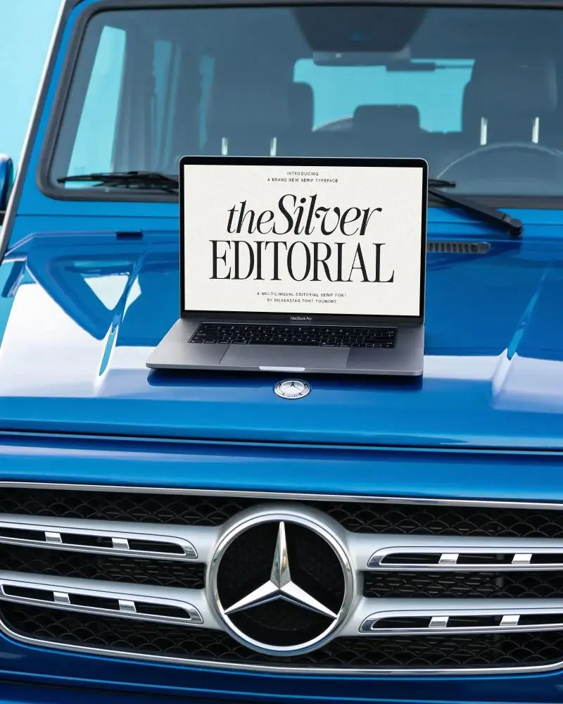 Sleek Macbook Pro M1 Mockup Placed On Luxury Limited Edition Car Hood For Stylish Presentation