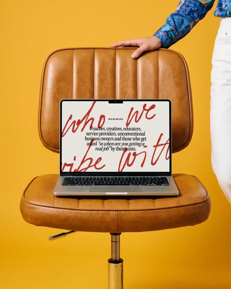 Modern Macbook M5 Mockup On Vintage Leather Office Chair For Design Showcase