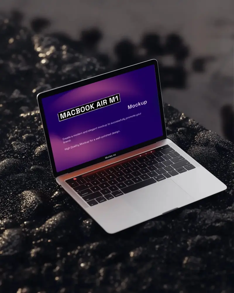 Sleek Macbook Air M1 Mockup On Black Sand Beach With Clear Screen Display And Soft Lighting