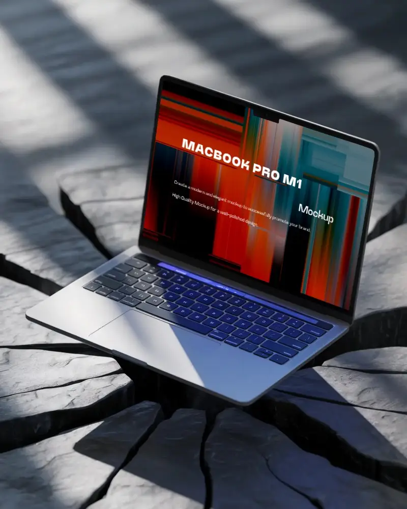Macbook Pro M1 Mockup On Split Stone Surface With Bold Shadows And Natural Daylight Highlights