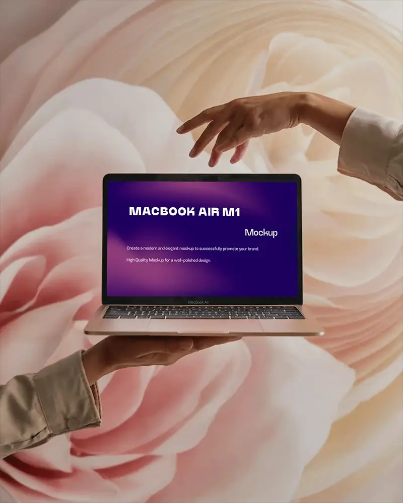 Macbook Air M1 Mockup Held In Hands With Abstract Rose Blossom Background And Elegant Light