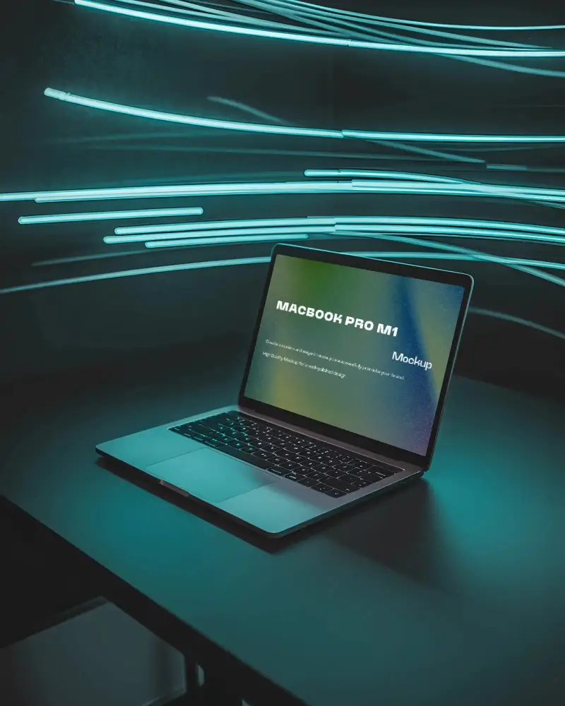 Macbook Pro M1 Mockup On Dark Desk With Electric Blue Light Trails In Modern Studio