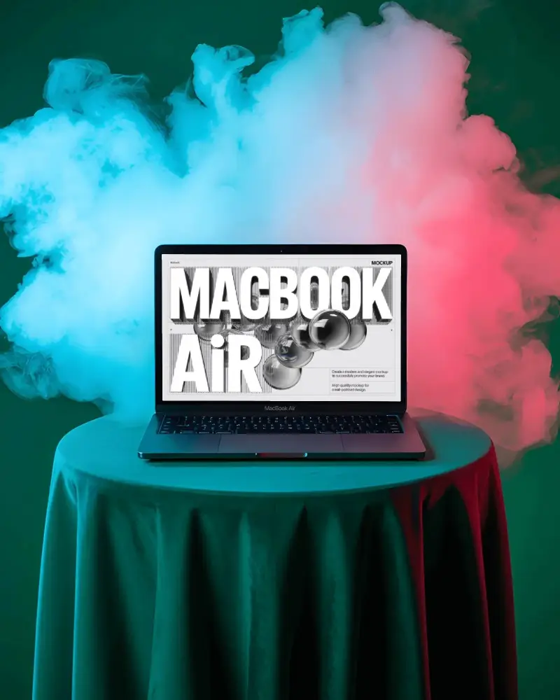 Macbook Air M1 Mockup On Cloth Covered Table With Blue And Red Fog In Vibrant Studio Scene