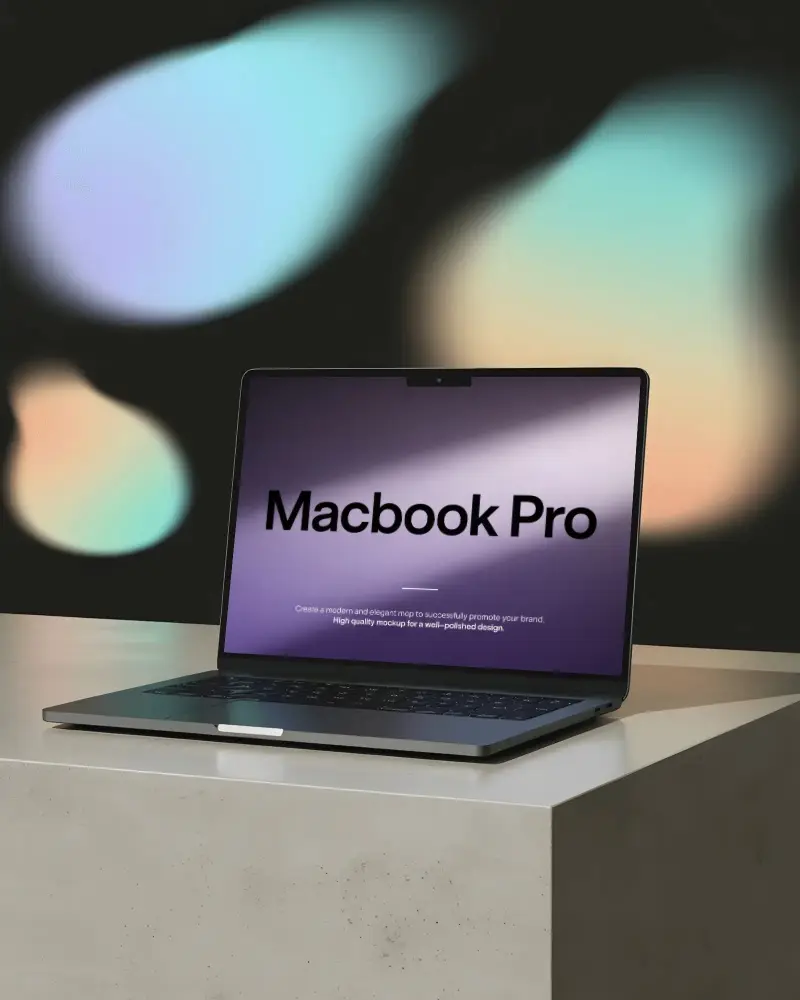 macbook-pro-m4-mockup-on-concrete-slab-with-soft-multicolor-bokeh-light-backdrop