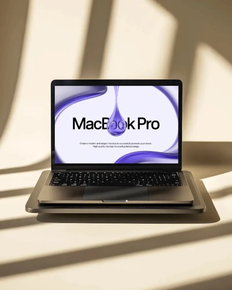 sunlit-shadow-play-macbook-m1-pro-mockup-front-view-on-warm-beige-minimal-background