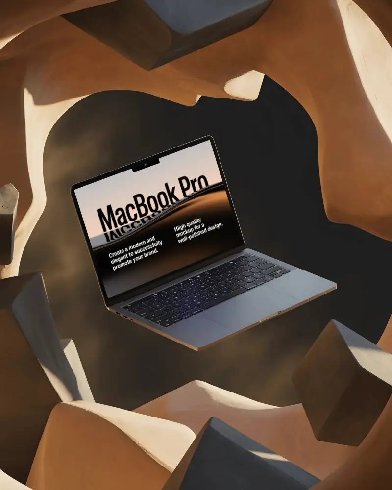 Macbook M2 Pro Mockup Floating Amid Organic Stone Forms In Earthy Sculptural Setting