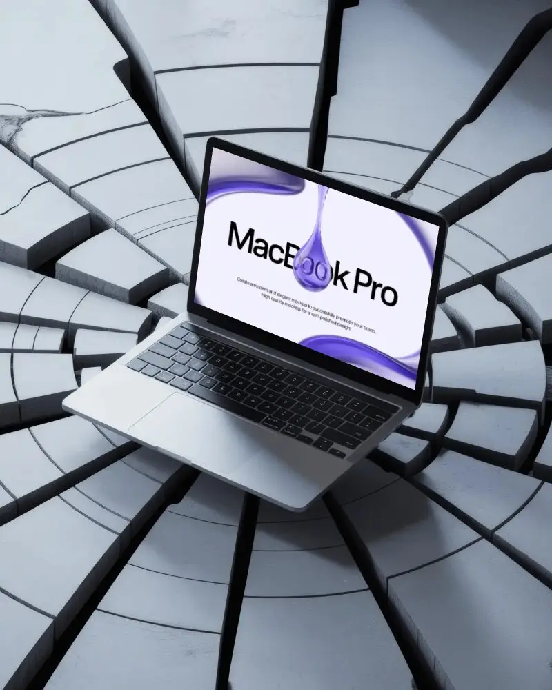Broken Ground Macbook M1 Pro Mockup Amid Circular Fractures Modern Dramatic Style
