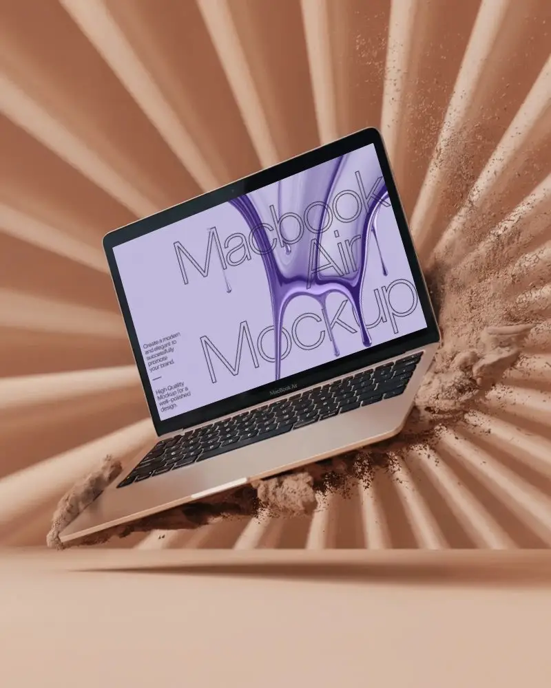 Macbook M1 Air Mockup Breaking Through Dust In Kinetic Motion Sandy Background