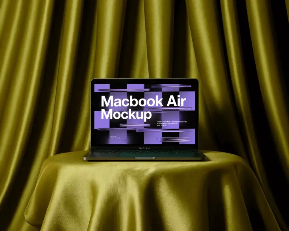 Macbook M1 Air Mockup On Golden Fabric Table With Curtain Backdrop In Soft Light