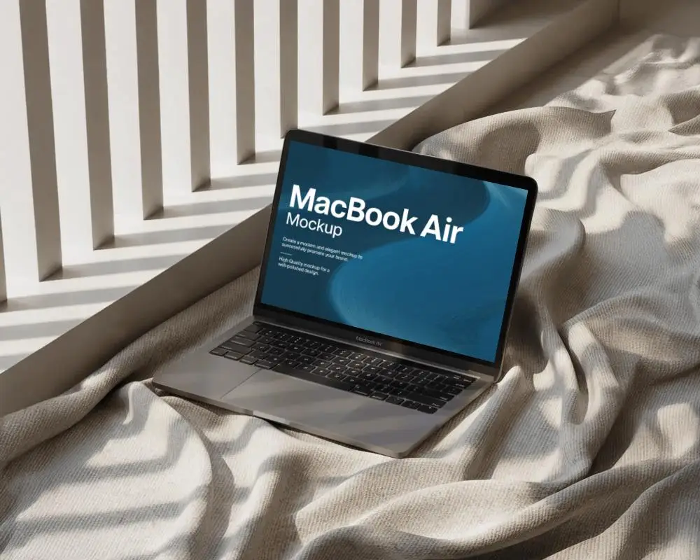 Macbook Air M1 Mockup On Soft Fabric Surface With Sunlight Filtered Through Vertical Shades
