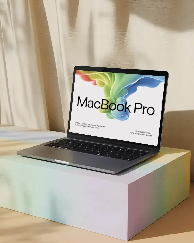 Macbook Pro M1 Mockup On Pastel Block With Curtain Shadows In Soft Natural Light Setting
