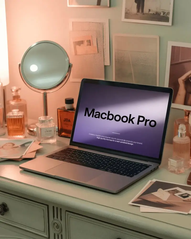 Macbook Pro M1 Mockup On Vanity Desk With Perfume Bottles Mirror And Soft Feminine Light
