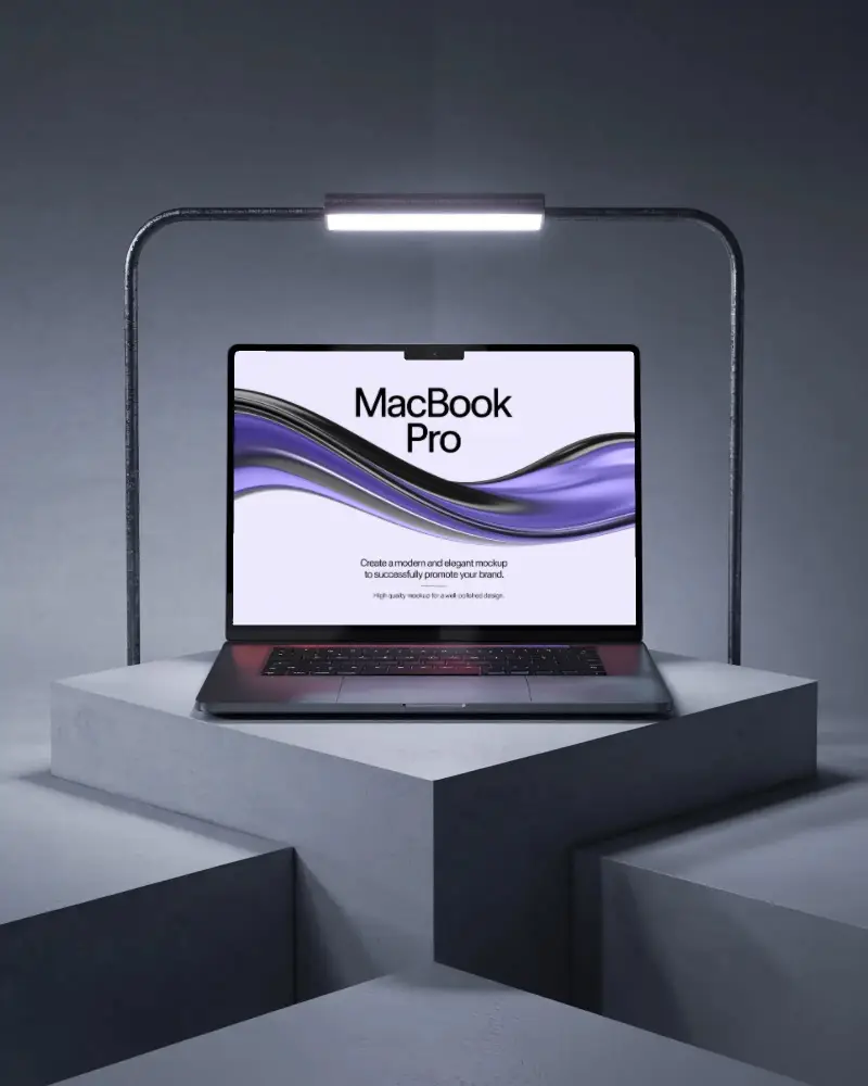 spotlight-macbook-m4-pro-mockup-on-angular-platform-with-industrial-arch-lighting-frame