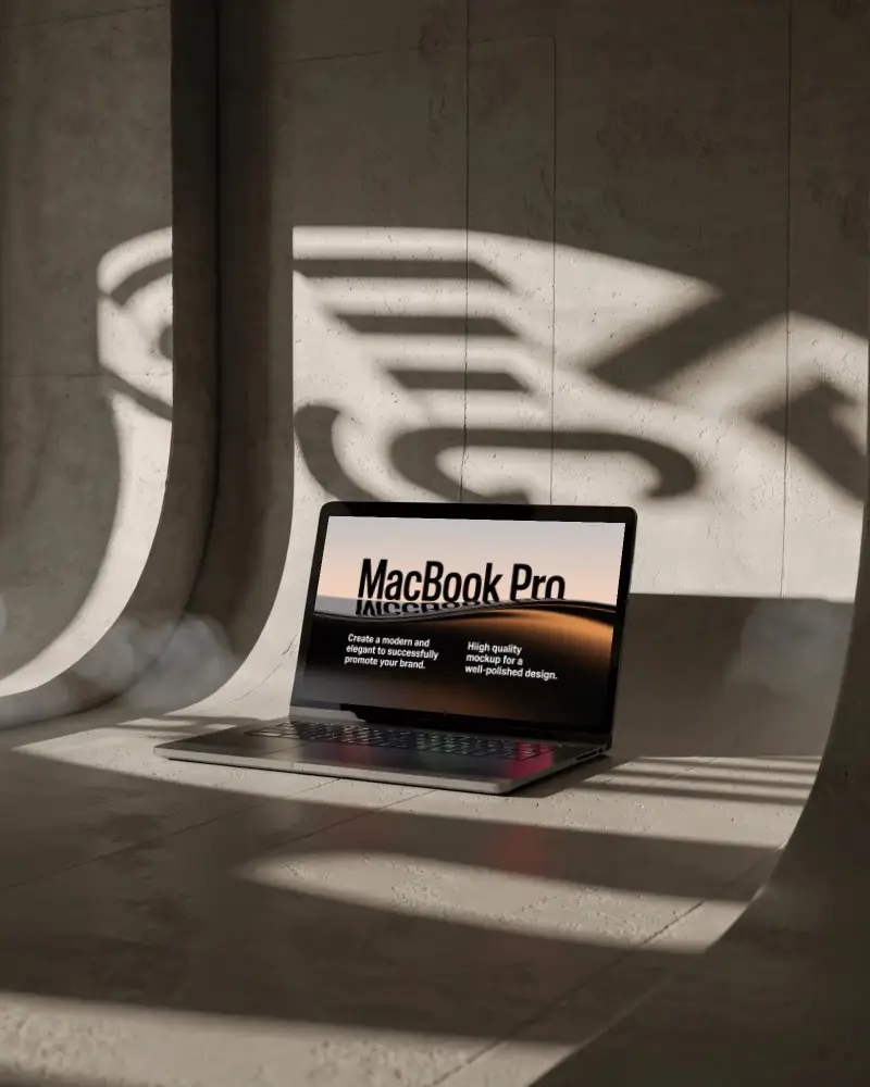 artistic-macbook-pro-m1-mockup-in-arched-stone-room-with-abstract-light-patterns-and-depth
