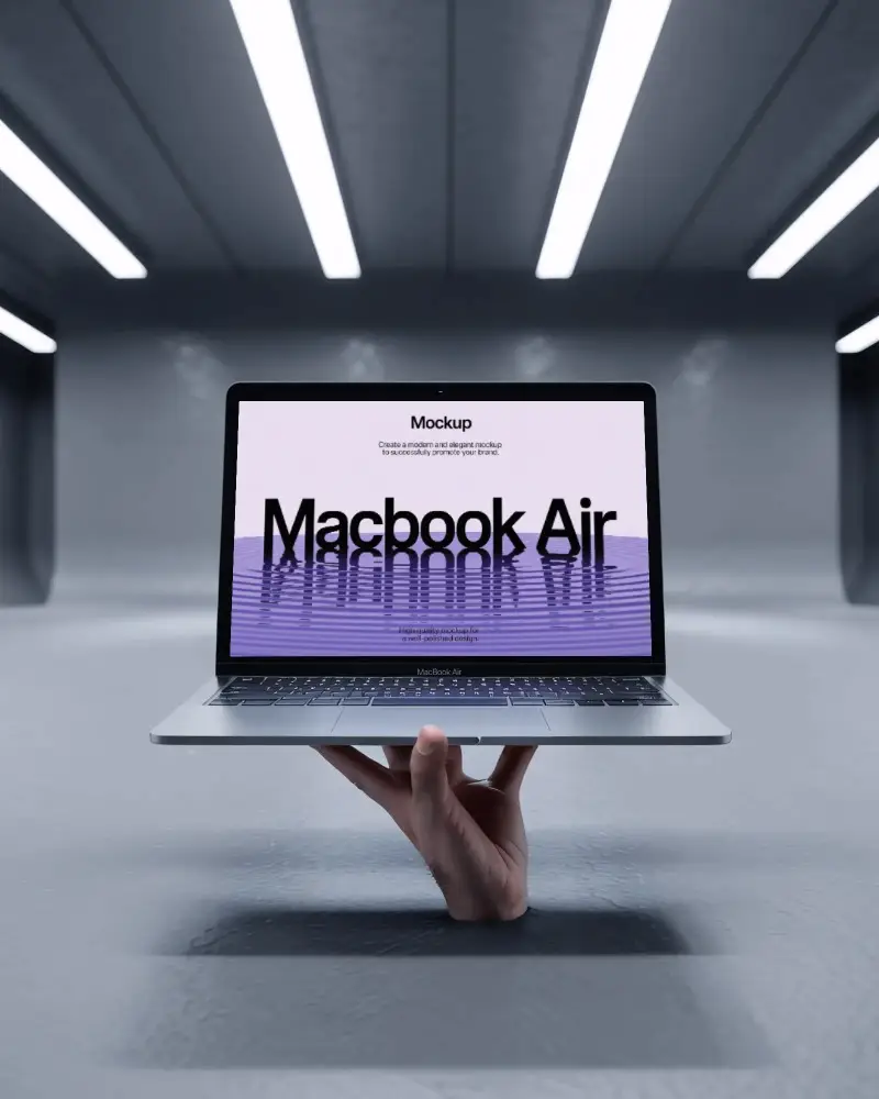hand-holding-macbook-air-m1-in-sci-fi-inspired-studio-with-smooth-metallic-walls-and-lights