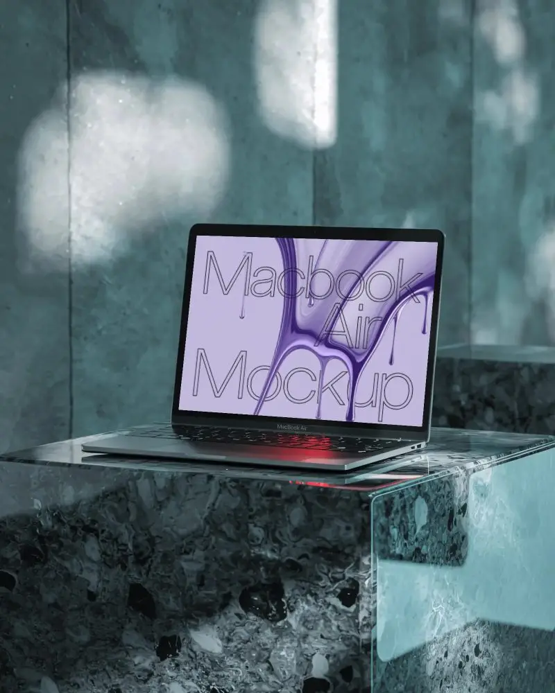 M1 Air Mockup On Glassy Stone Block In Elegant Sun Dappled Room With Mint Green Tones