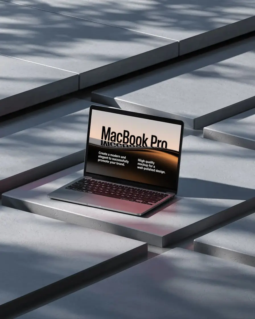 M1 Pro Mockup On Minimal Sunken Platform With Geometric Concrete Tiles And Soft Shadows