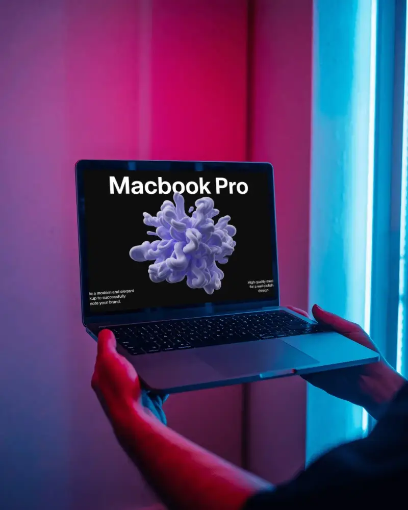 Neon Dual Tone M1 Pro Mockup Held Against Hyper Modern Cyber Light Panels