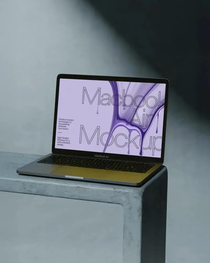 Macbook M1 Air Mockup On Concrete Surface With Dramatic Spotlight And Dark Minimal Aesthetic