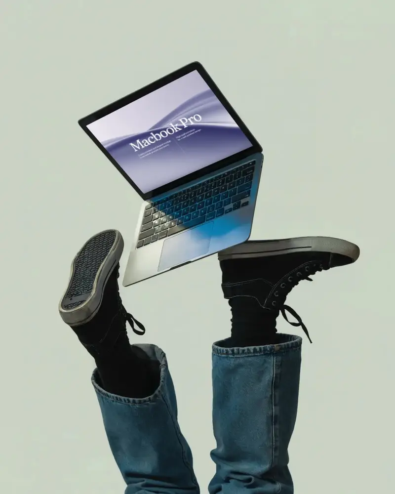M1 Pro Macbook Mockup Floating Above Upside Down Legs With Playful Modern Minimal Aesthetic
