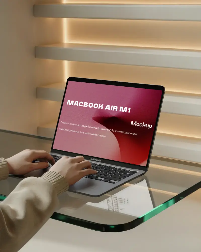 Macbook Air M1 On Glass Table Hands Typing Warm Lighting Modern Interior Horizontal Shelves