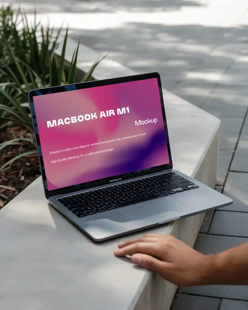 Macbook Air M1 Outdoor Concrete Bench Sidewalk Hand Resting Urban Greenery