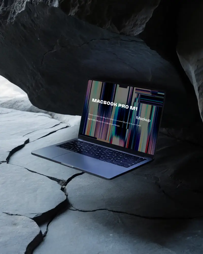Macbook M1 Pro Mockup Floating Between Dark Slate Rocks And Light Cracks In Shadowy Cavern Environment Cool And Mysterious Composition