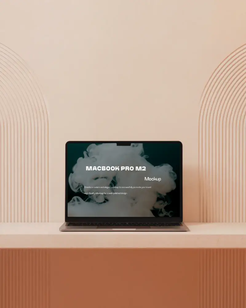 Macbook M2 Pro Mockup On Peach Sandstone Shelf Against Arched Texture Wall Soft Neutral Lighting Modern Interior Display