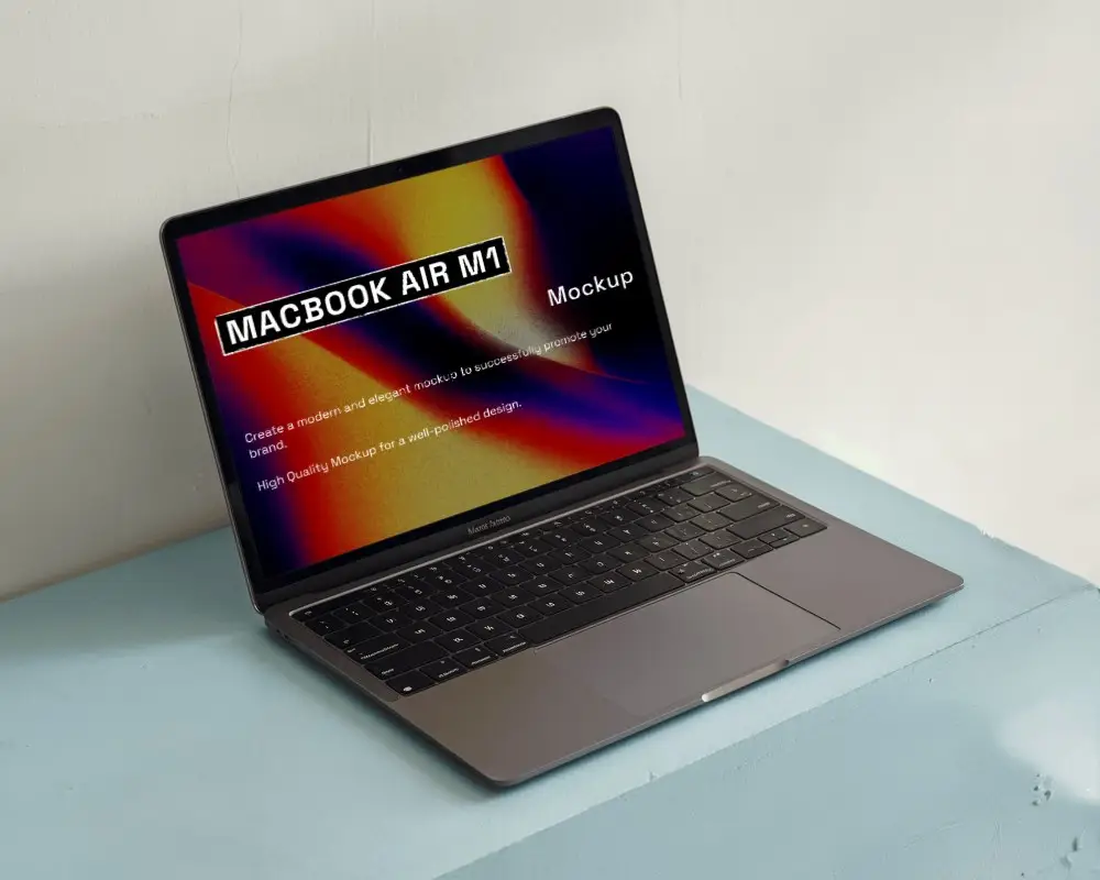 Sunlit Macbook Mockup On Pastel Blue Table Minimal And Trendy