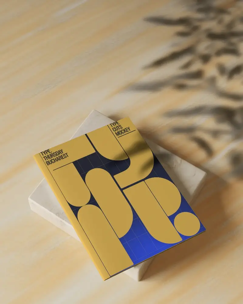 Sunlit Podium Magazine Mockup On Wooden Surface With Soft Leaf Shadow Overlay