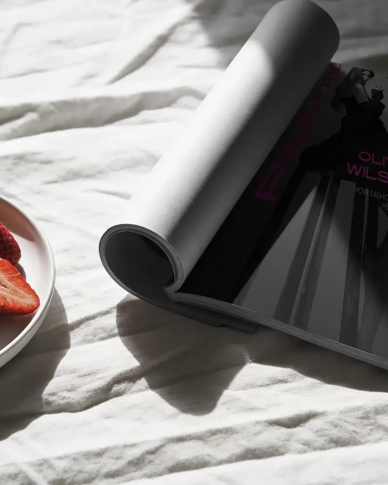 Minimalist Magazine Mockup With Rolled Pages On Soft Textured Background