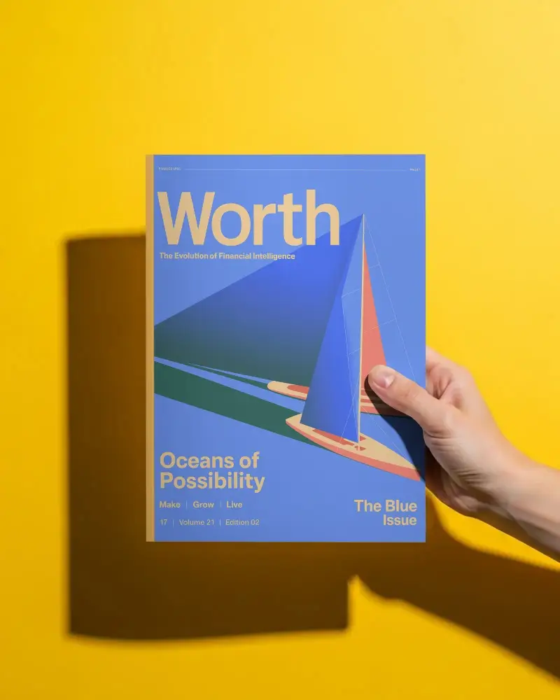 Vertical Magazine Mockup Held In Hand Against Plain Background For Branding Projects