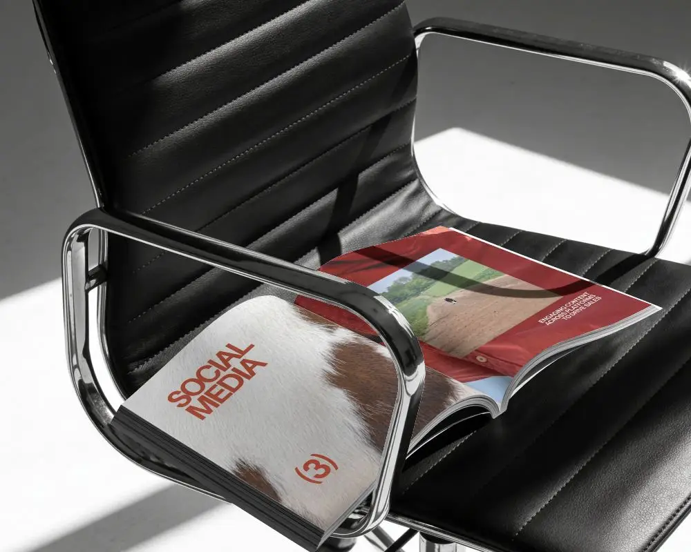 Minimalistic Open Magazine Mockup On Modern Lounge Chair With Natural Light