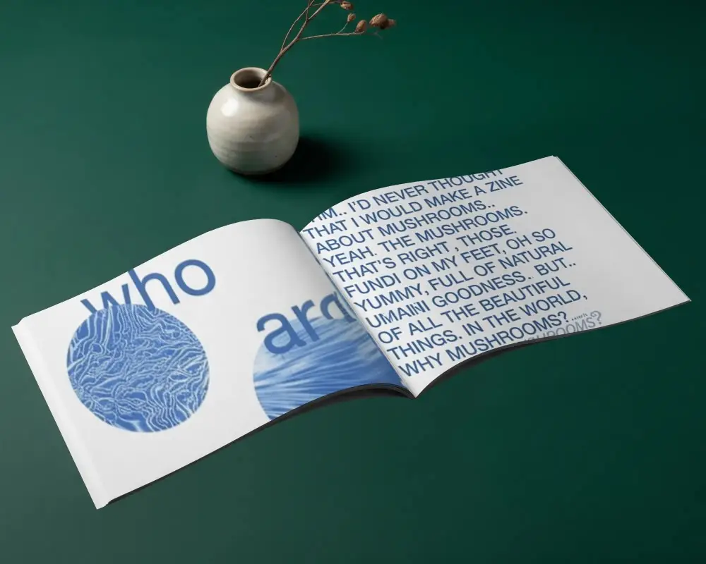 Horizontal Magazine Mockup With Open Pages And Minimalist Decoration On Surface