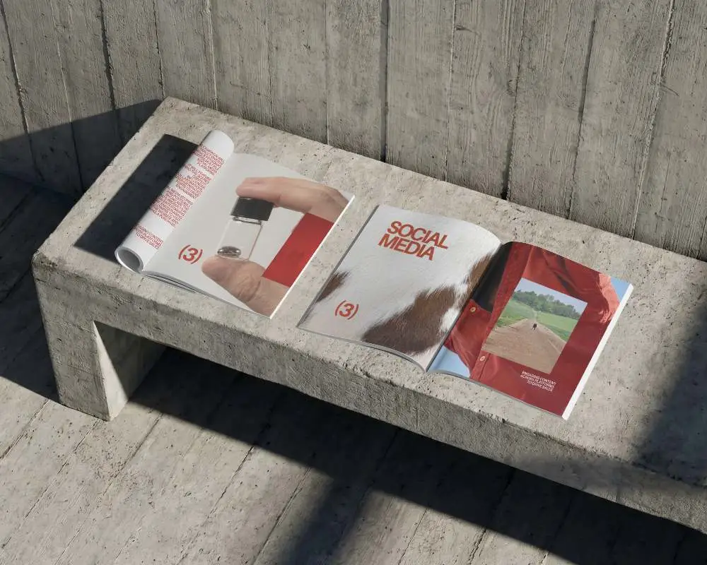 Open Magazine Mockup On Textured Concrete Surface With Natural Light And Shadows