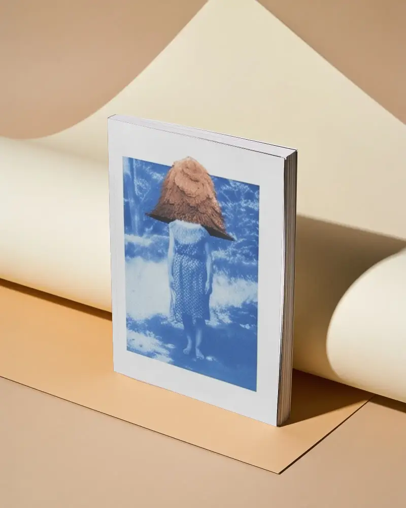 Sleek Minimalist Magazine Mockup Standing On Curved Paper Background For Design