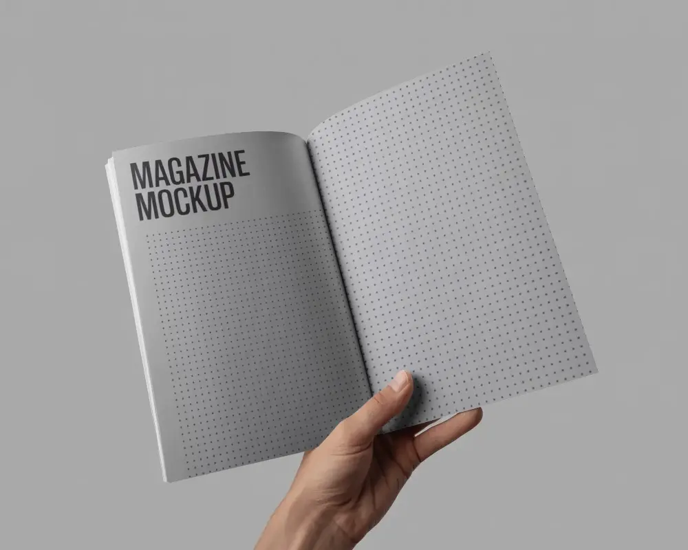 Open Magazine Mockup In Hand With Empty Pages For Advertisement Or Portfolio Display