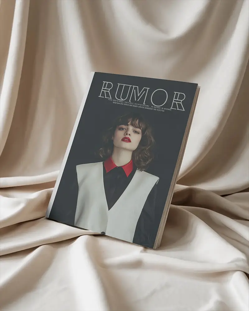 Elegant Upright Magazine Mockup Standing On Soft Beige Draped Fabric With Gentle Natural Lighting 0221