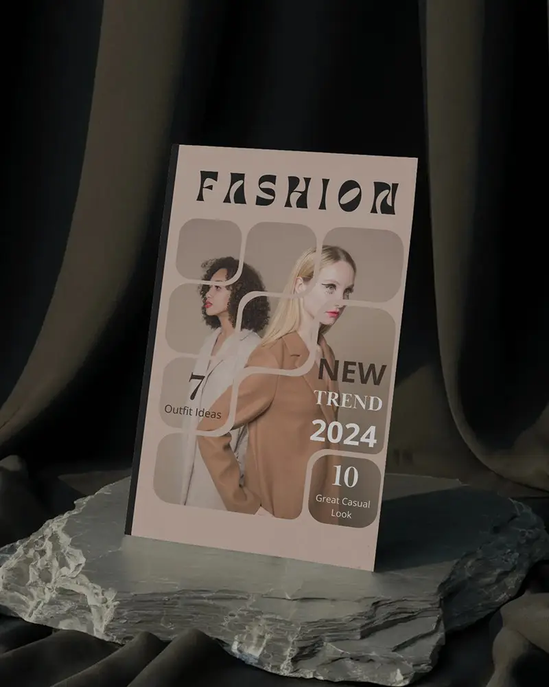 Upright Magazine Mockup On Rough Stone Slab With Draped Dark Fabric Background And Dramatic Light 0224